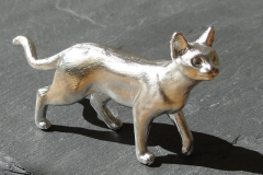 Zinn-Katze-gross